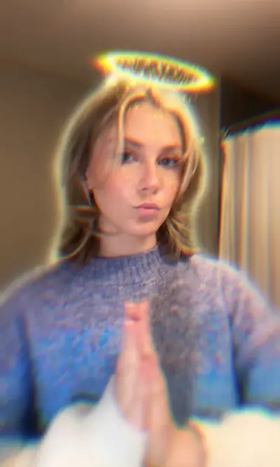Beauty creator filming a stylized get-ready-with-me video